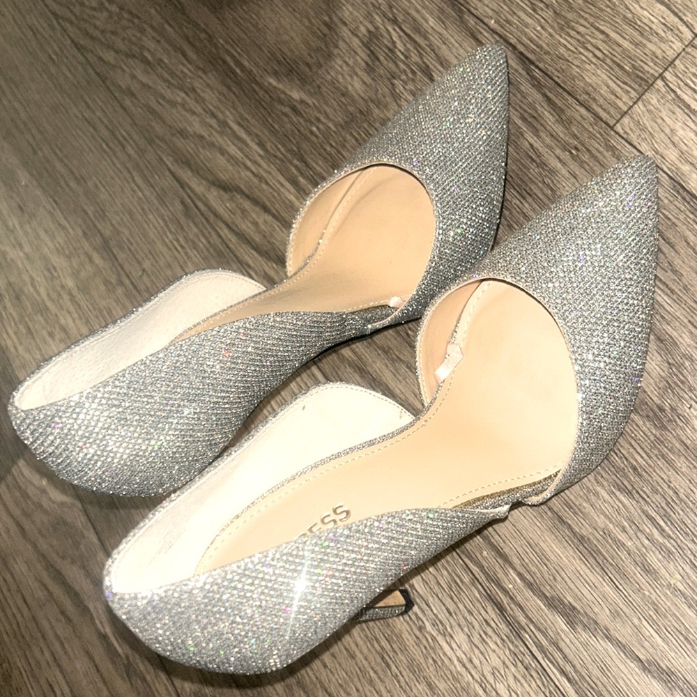 Size 7 Express silver glittery heels. Never worn!